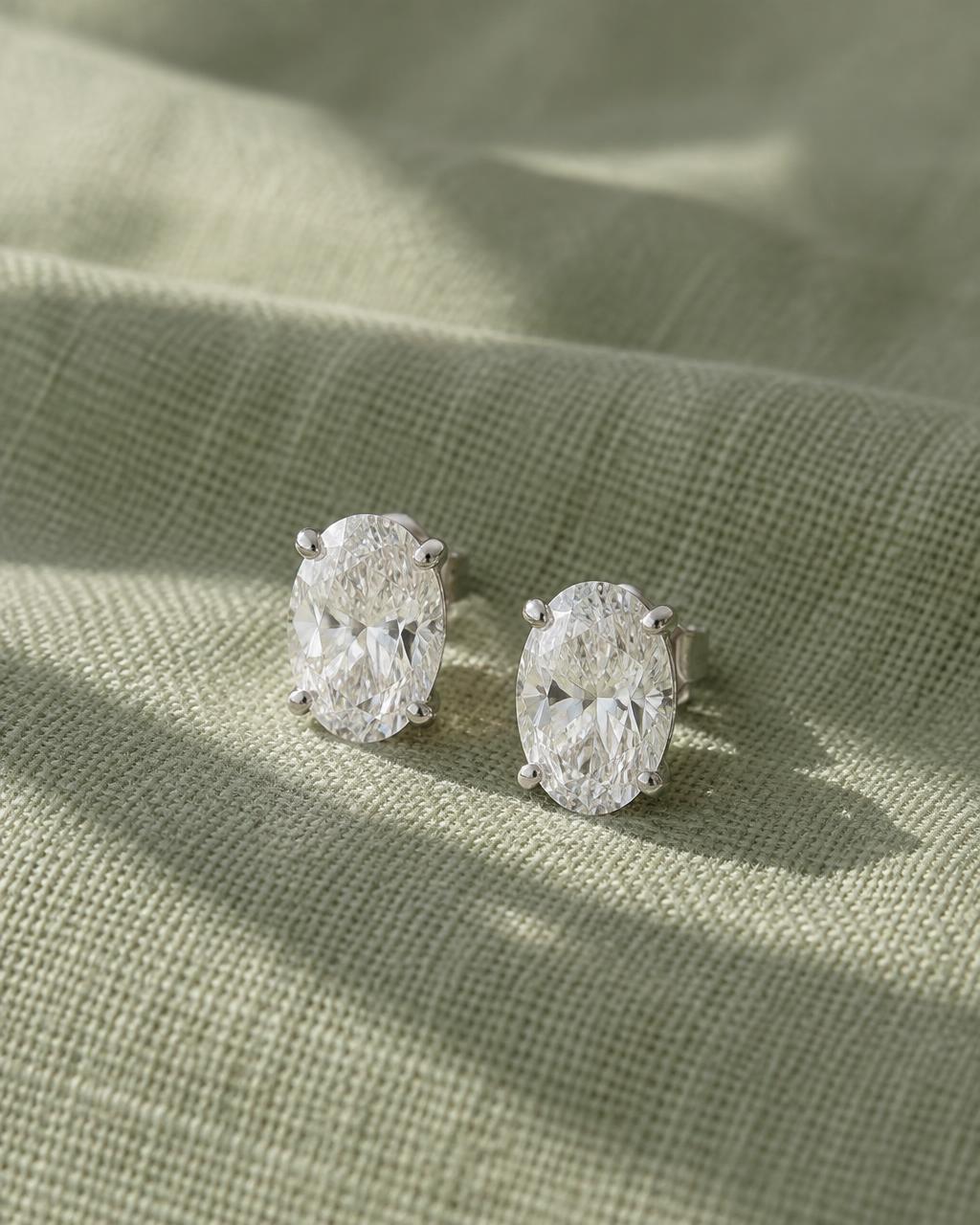 Oval diamond stud earrings