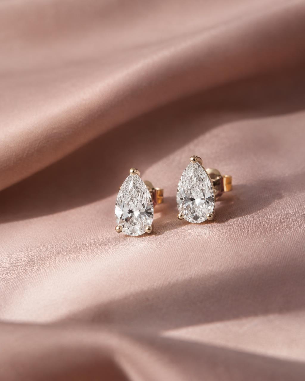 Pear diamond stud earrings